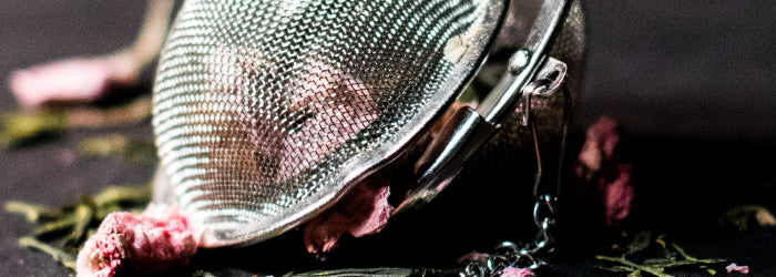 Tea balls that clamp or latch to hold leaves inside are widely used for black and herbal teas