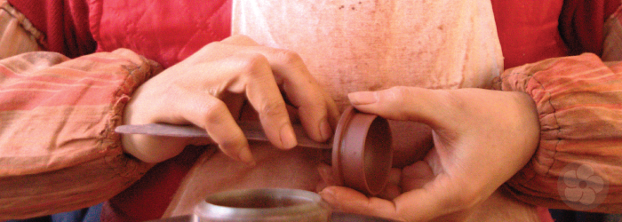 Many yixing studios use molds to create consistent designs, which are then refined by hand